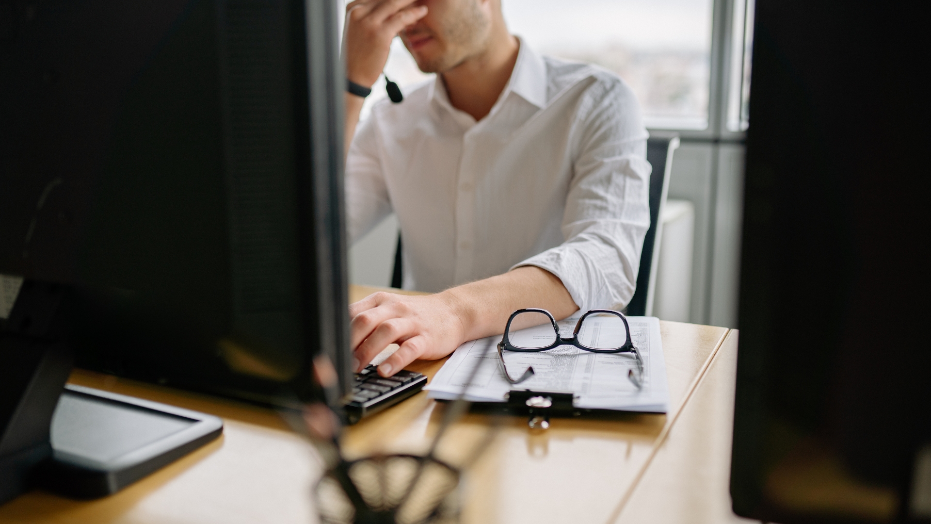 Frustrated business owner dealing with an IT problem