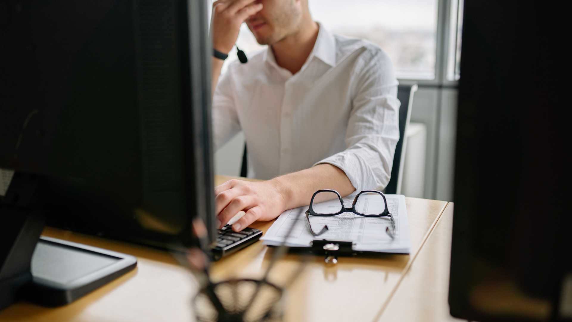 Frustrated business owner dealing with an IT problem